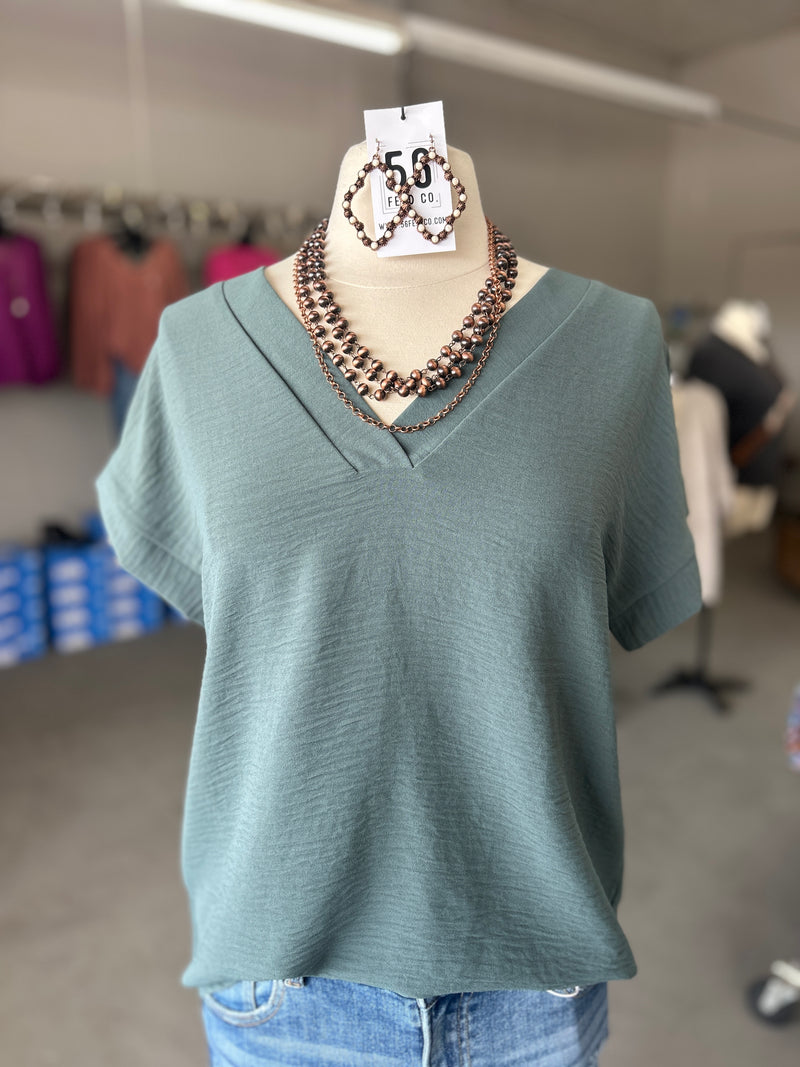 Women's Ash Jade Woven Airflow V-Neck Hi-Low Hem Top