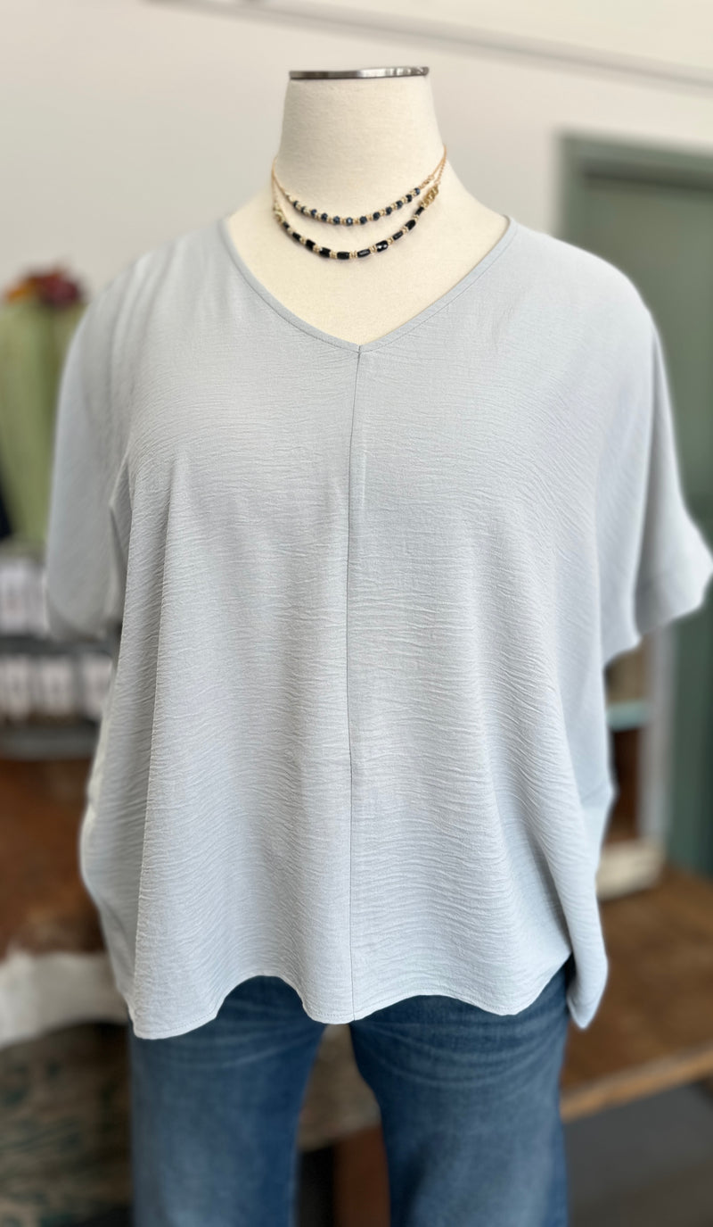 Women's Cement Woven Airflow V-Neck Top