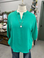 Women's Kelly Green Long Sleeve Solid Woven Top